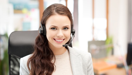 smiling female helpline operator with headset